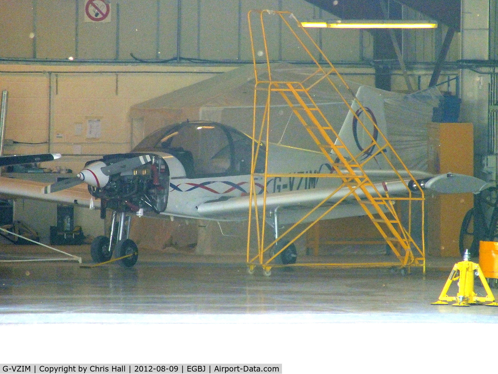 G-VZIM, 2007 Alpha R2160 C/N 160A-07012, at the rear of one of the maintenance hangars