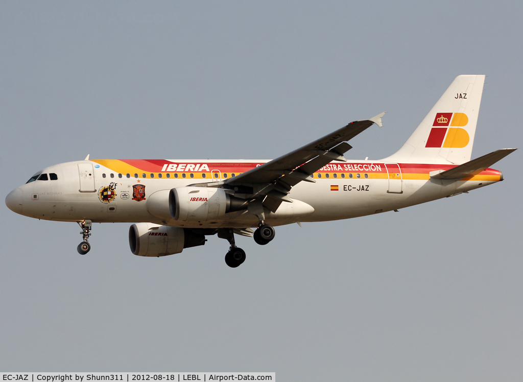 EC-JAZ, 2004 Airbus A319-111 C/N 2264, Landing rwy 25R with additional Football stickers and titles...