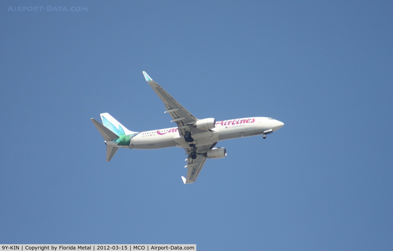 9Y-KIN, 2000 Boeing 737-8Q8 C/N 28234, Caribbean Air passing over Orlando Executive on way into MCO