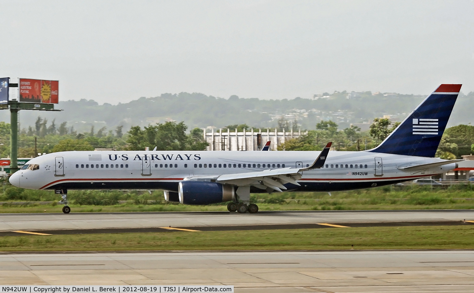 N942UW, 1995 Boeing 757-2B7 C/N 27807, This US Airways 757 is rolling to a stop, its spoilers and flaps still extended.