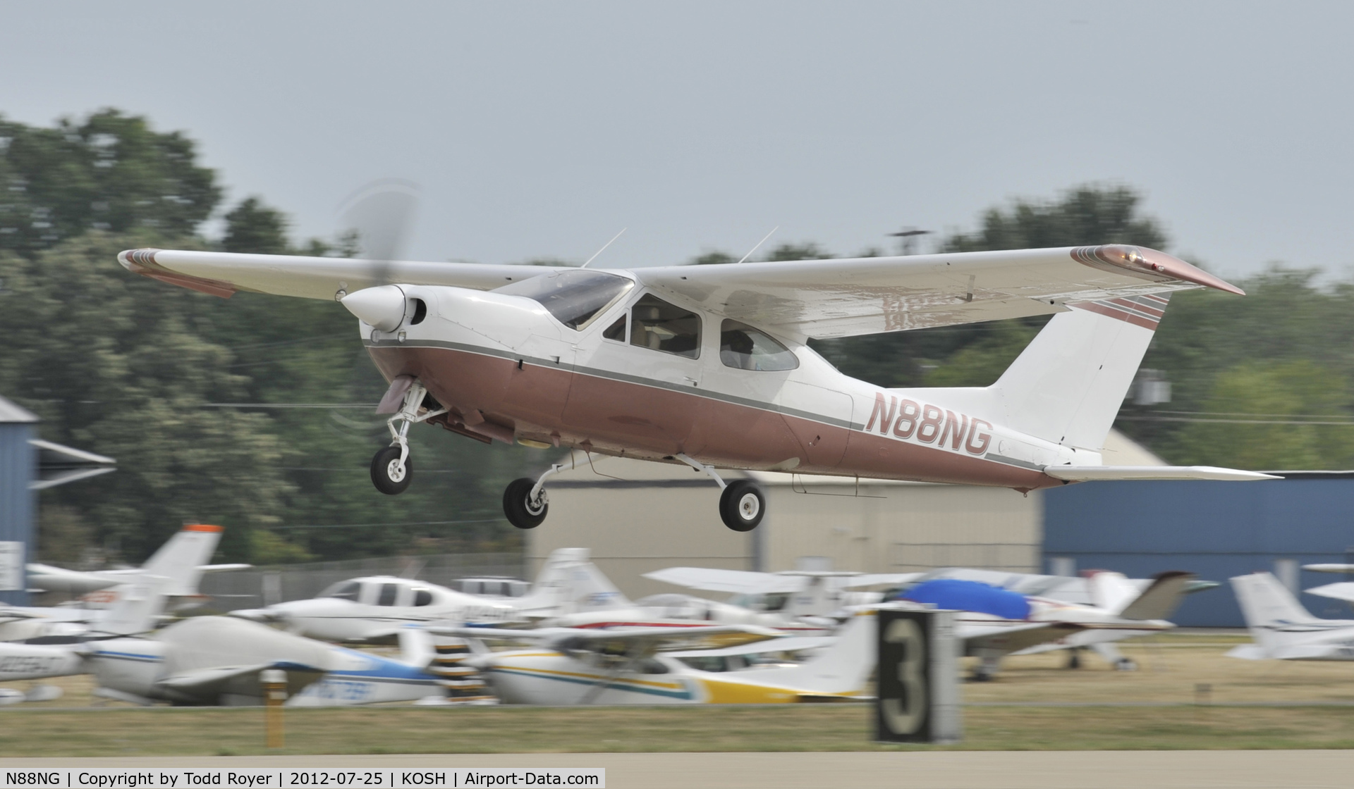 N88NG, 1977 Cessna 177RG Cardinal C/N 177RG1223, Departing Airventure 2012
