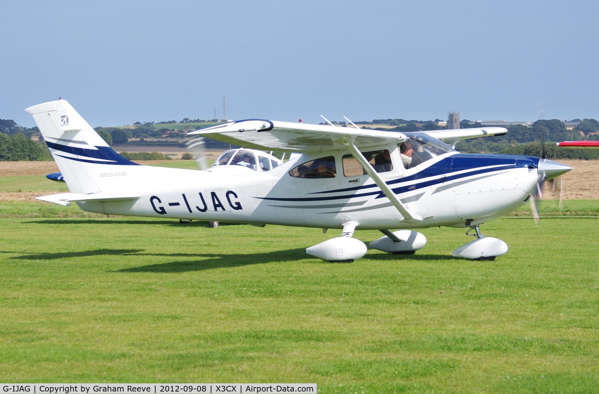 G-IJAG, 2005 Cessna 182T Skylane C/N 18281683, Just landed.
