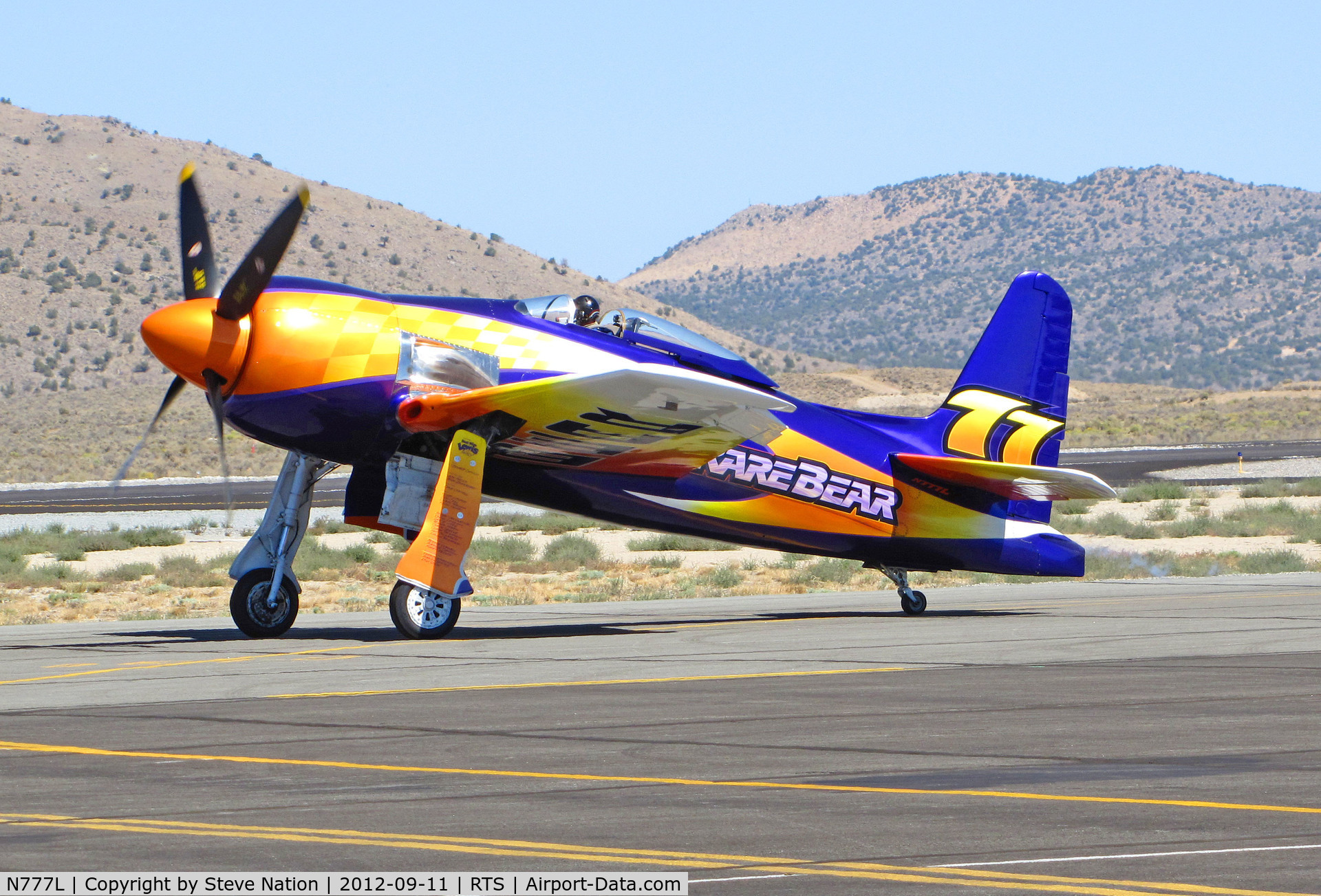 N777L, 1946 Grumman F8F-2 (G58) Bearcat C/N D.1170, Stewart Dawson piloting psychedelic F8F-2 RARE BEAR #77 after qualifying run @ on September 11, 2012 at Stead Airport during Reno Air Races
