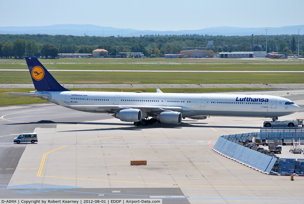 D-AIHH, 2004 Airbus A340-642 C/N 566, Being towed down to parking