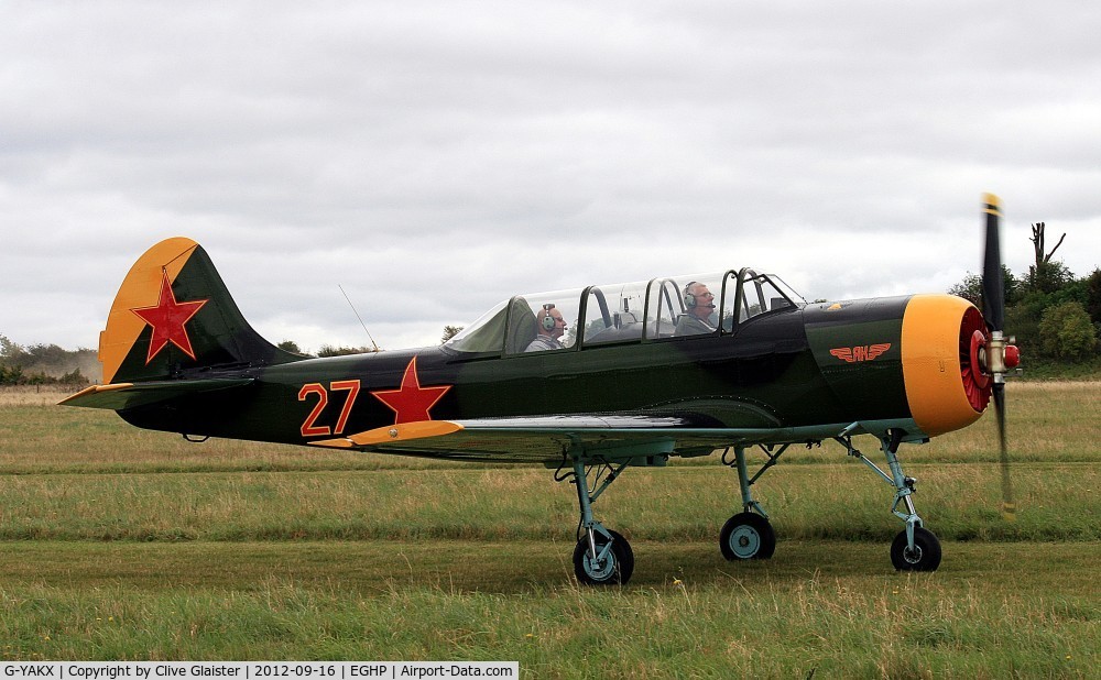 G-YAKX, 1991 Yakovlev (Aerostar) Yak-52 C/N 9111307, Ex: DOSAAF 27 > RA-9111307 > G-YAKX > RA-44473 > G-YAKX - Originally in private hands in March 1996 and currently with, The X-Fliers Ltd since November 2002.