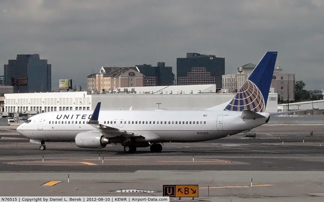 N76515, 2008 Boeing 737-824 C/N 31623, One of United's Boeing 737s glides past Newark's northern cargo terminal.