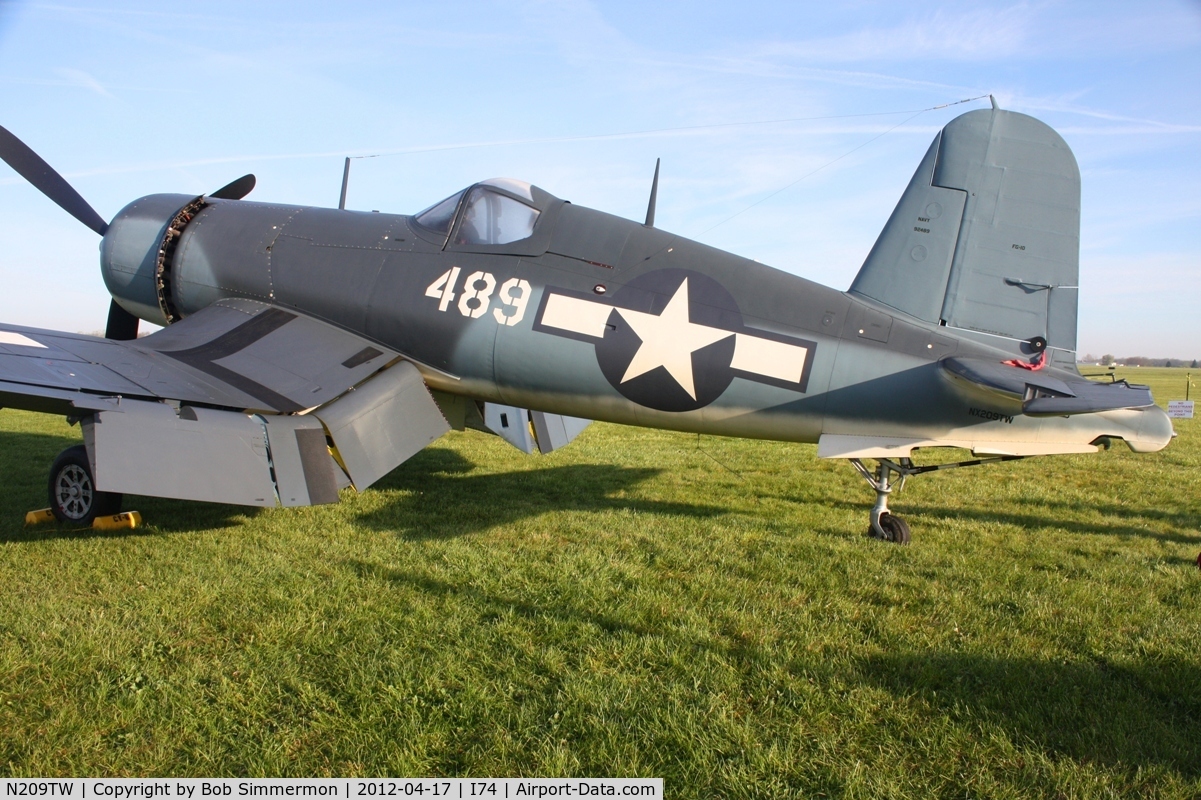 N209TW, Goodyear FG-1D Corsair C/N 3750, Dawn in the grass at Urbana, Ohio.  B-25 Gathering and Doolittle Reunion.