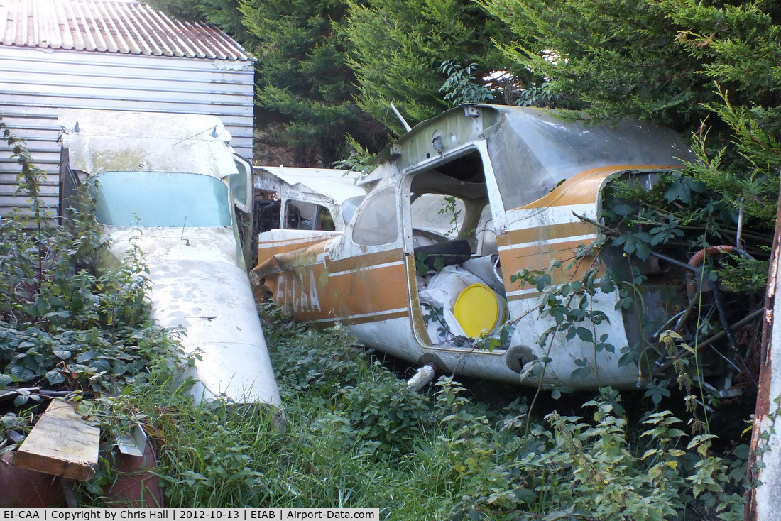 EI-CAA, Reims FR172J Reims Rocket C/N 0486, in the bone yard behind the hangars at Abbeyshrule