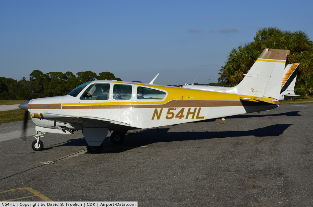 N54HL, 1972 Beech F33A Bonanza C/N CE-376, Beech about to take off from Cedar Key, Florida on a beautiful day to fly.