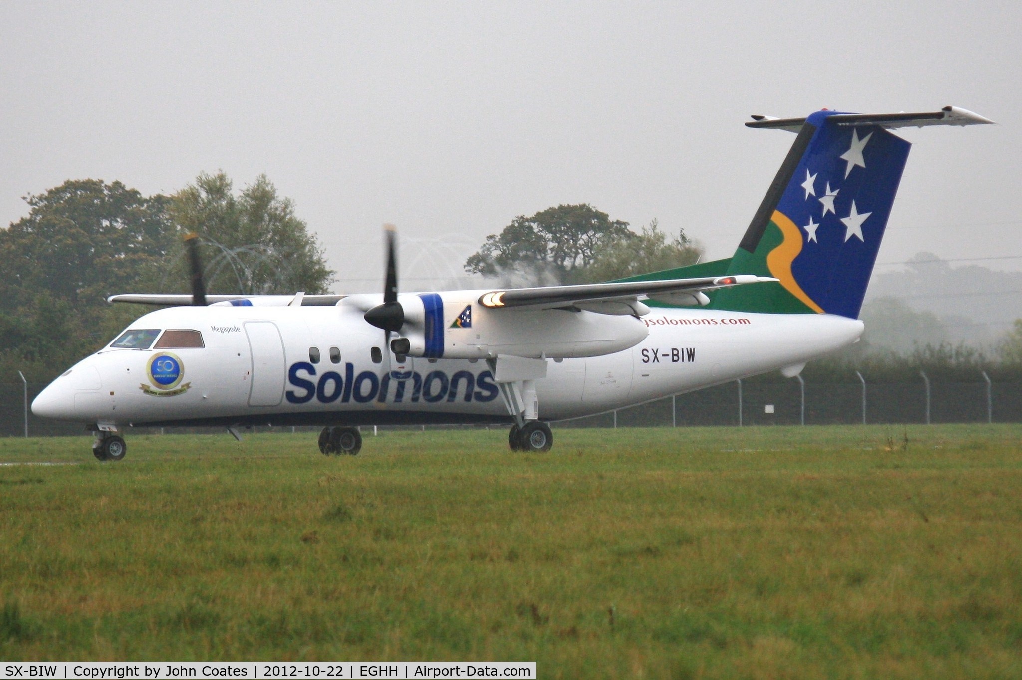 SX-BIW, 1991 De Havilland Canada DHC-8-102 Dash 8 C/N 289, Misty morning departure after respray at Airbourne Colours