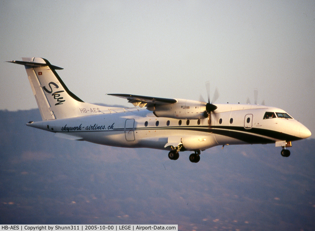 HB-AES, 1995 Dornier 328-110 C/N 3021, On landing... in old c/s