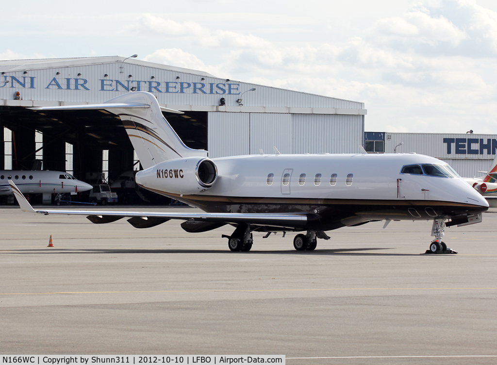 N166WC, 2008 Bombardier Challenger 300 (BD-100-1A10) C/N 20214, Parked at the General Aviation apron...