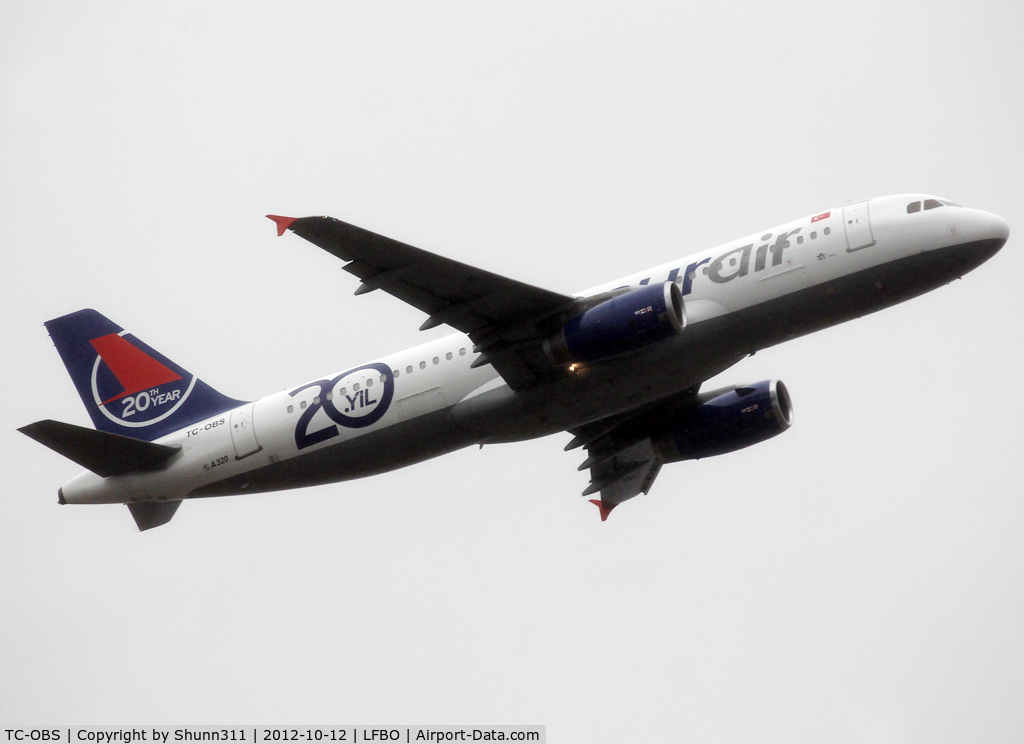 TC-OBS, 1997 Airbus A320-232 C/N 543, Taking off from rwy 32R... '20th anniversary' titles