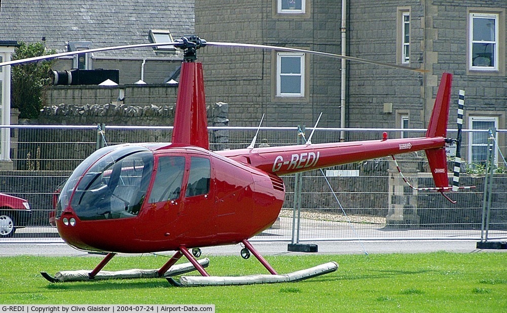 G-REDI, 2000 Robinson R44 Clipper C/N 0817, G-REDI > 4R-SVG - Originally and currently with, Redeye.Com Ltd in August 2000. Photo taken at Weston-super-Mare sea-front. To 4R-SVG August 2009.