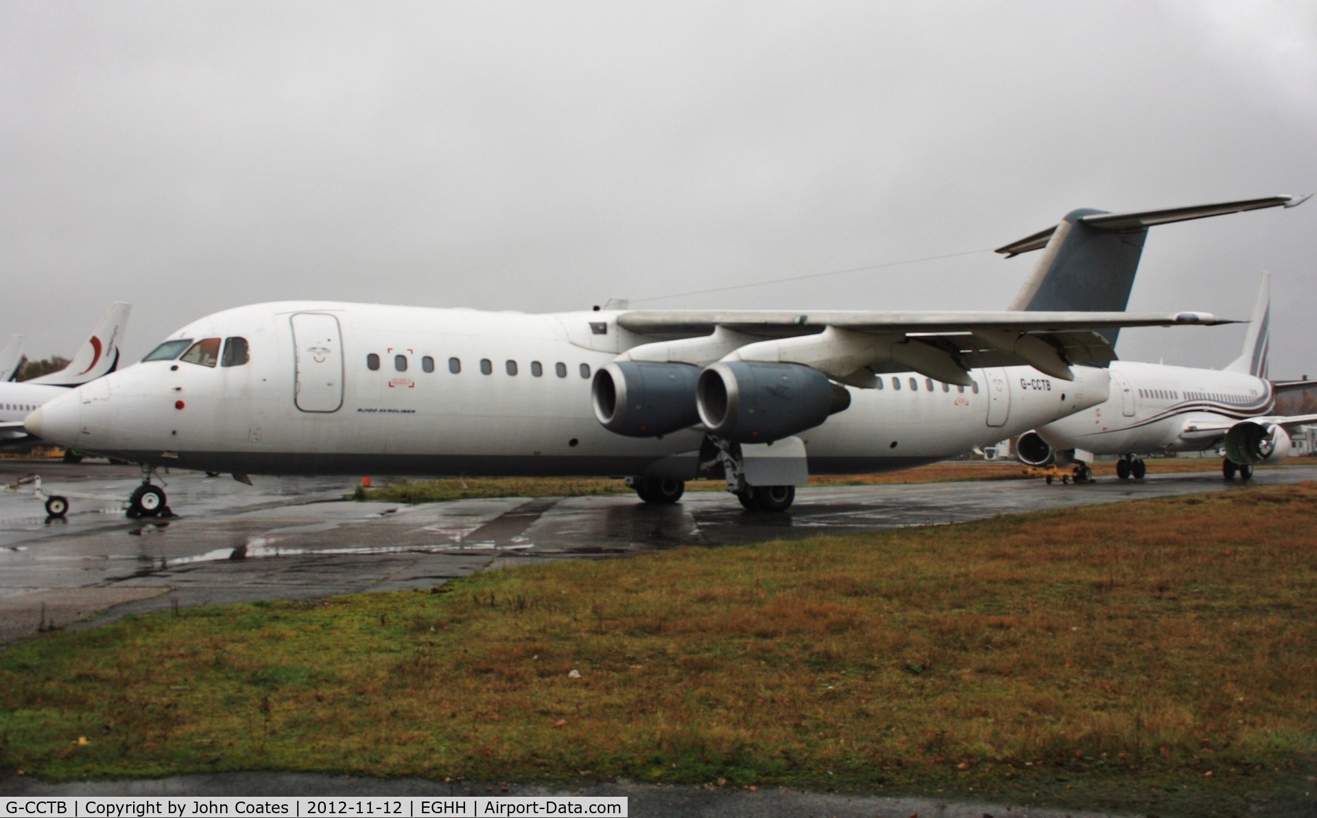 G-CCTB, 1993 British Aerospace Avro 146-RJ100 C/N E3234, Waiting in the drizzle for its turn in the paintshop.