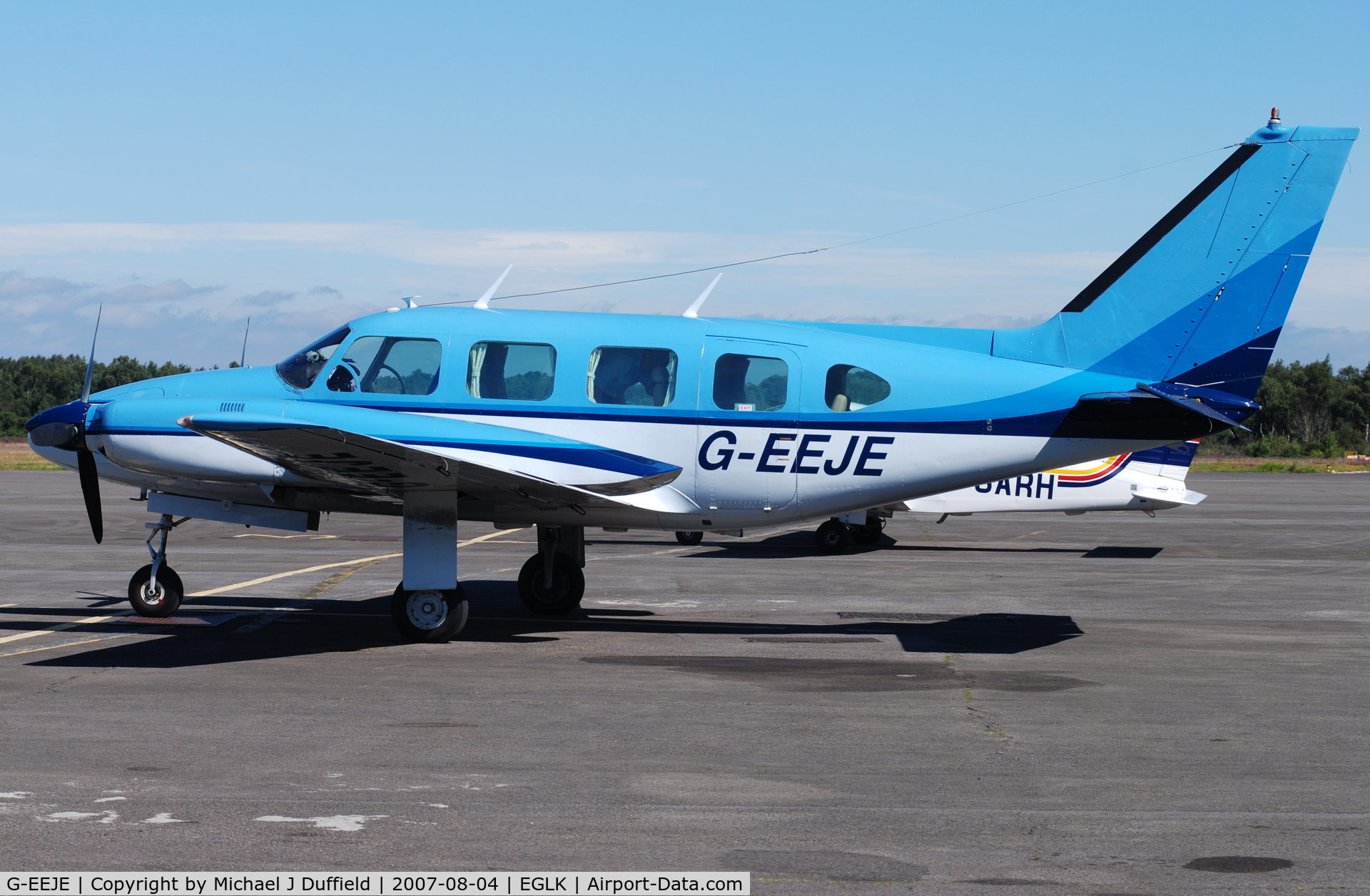 G-EEJE, 1972 Piper PA-31 Navajo C/N 31-825, Colourful Navajo seen at Blackbushe on 4th August 2007