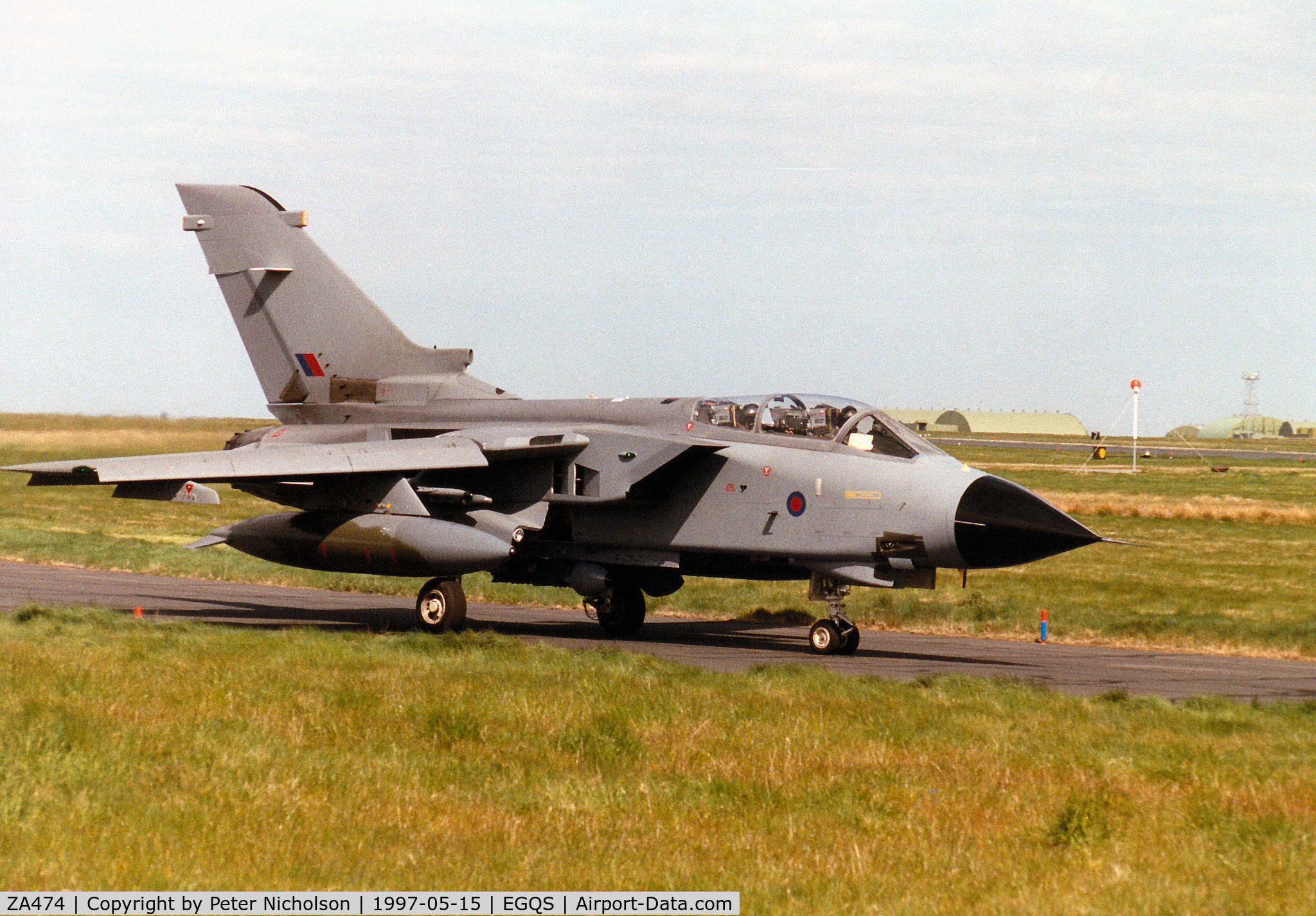 ZA474, 1983 Panavia Tornado GR.1B C/N 300/BS104/3140, Tornado GR.1B, callsign Jackal 1, of 12 Squadron taxying to Runway 05 at RAF Lossiemouth in the Summer of 1997.