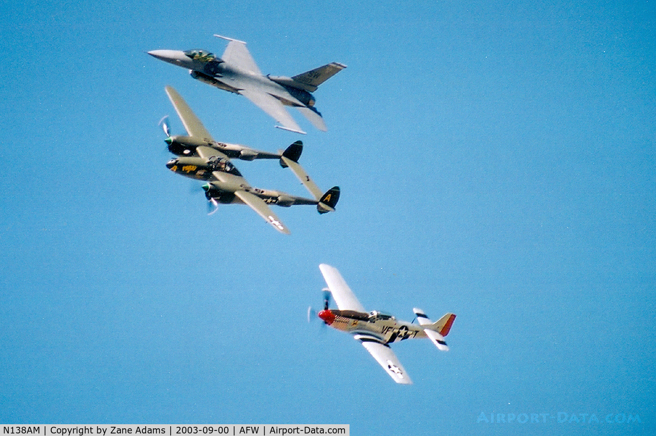 N138AM, 1943 Lockheed P-38J Lightning C/N 44-23314, N138AM (P-38), N51VF (P-51),  98-003 (F-16) Heritage Flight during the 2003 Alliance Airshow