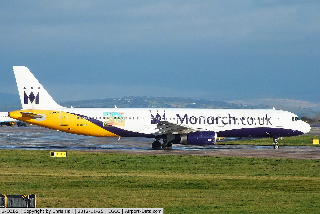 G-OZBS, 2001 Airbus A321-231 C/N 1428, Featuring a design made by an airline employee's child, it represents the city of Munich, which is a new destination from Manchester for Monarch.