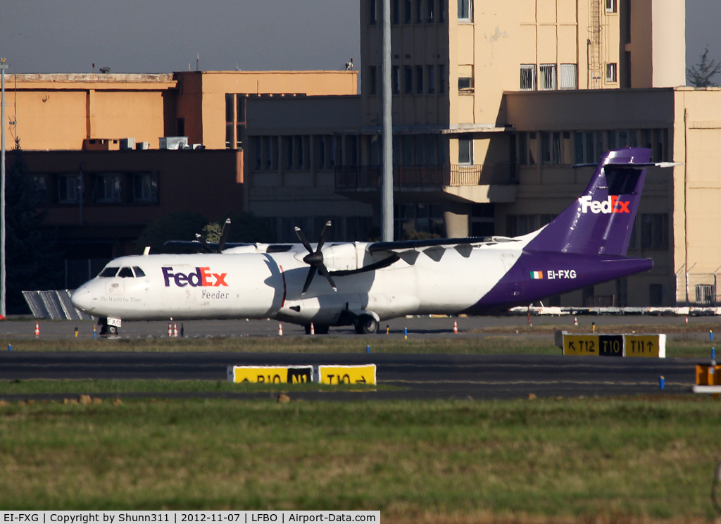 EI-FXG, 1991 ATR 72-202 C/N 224, Parked at the General Aviation area...