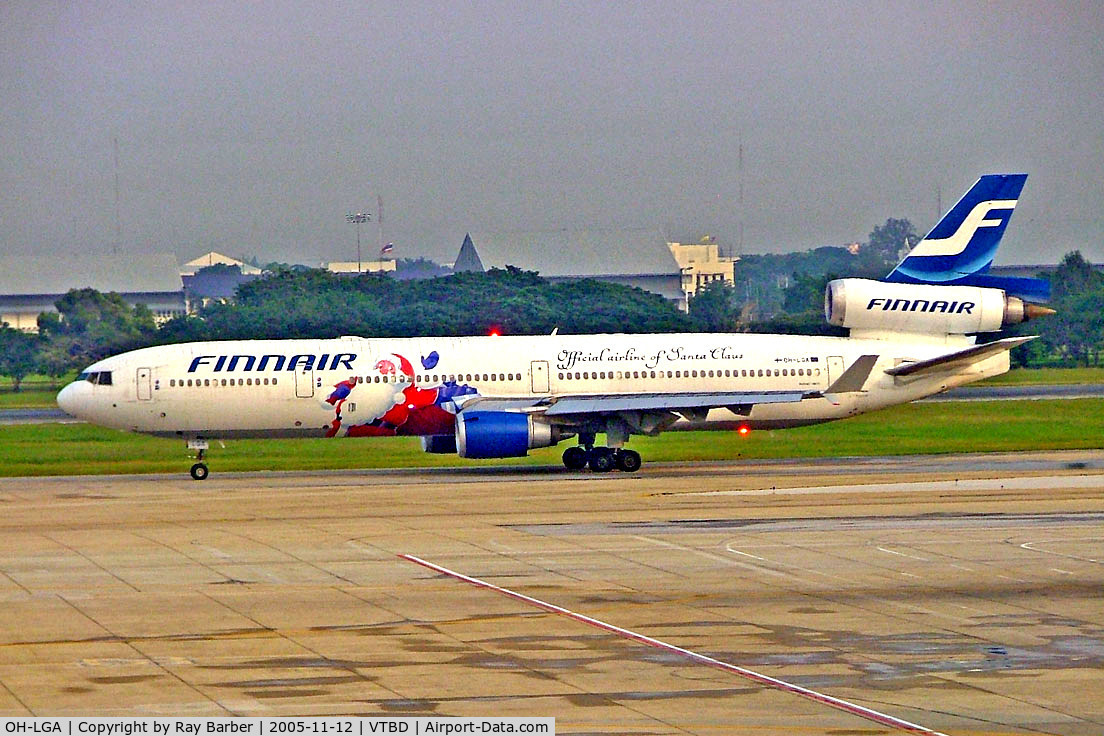 OH-LGA, McDonnell Douglas MD-11 C/N 48449, McDonnell-Douglas MD-11 [48449] (Finnair) Bangkok~HS 12/11/2005. Taken through the glass of the terminal.