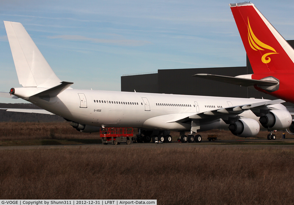 G-VOGE, 2001 Airbus A340-642 C/N 416, Stored in all white c/s without titles...