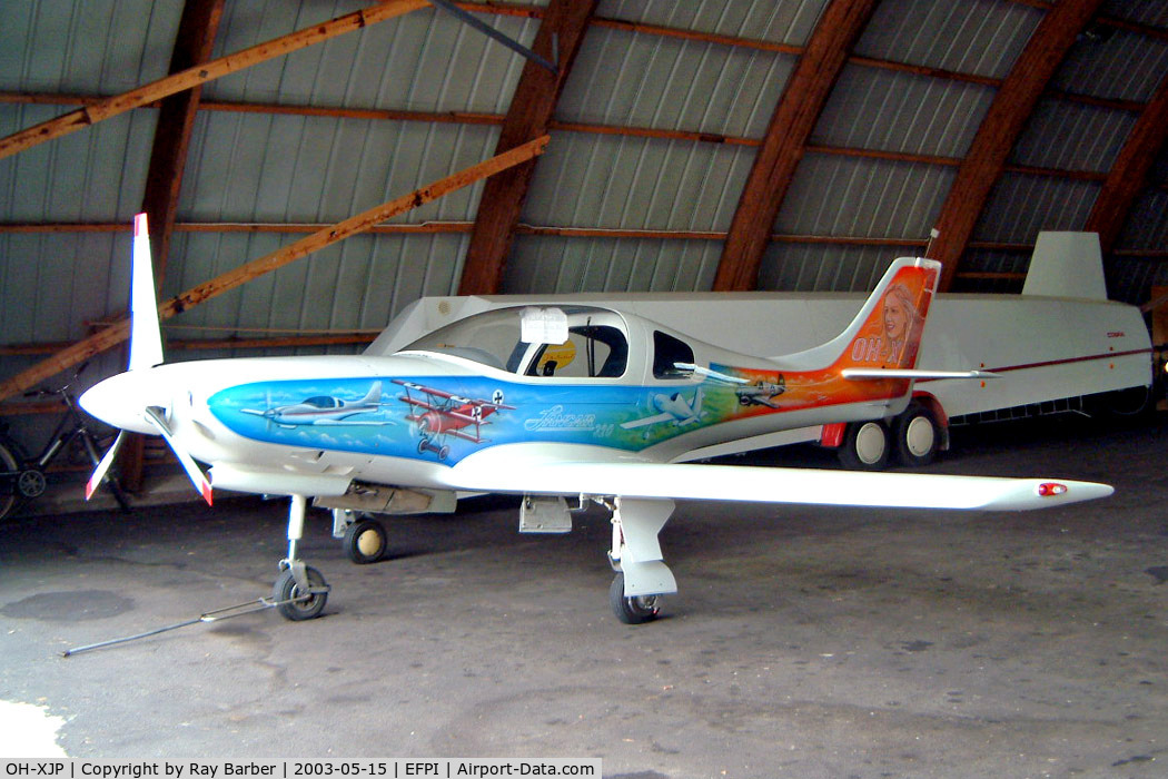 OH-XJP, Lancair 320 C/N 169, Lancair 320 [169] Piikajarvi~OH 15/05/2003. Showing the full art work on this side of the aircraft all are different.