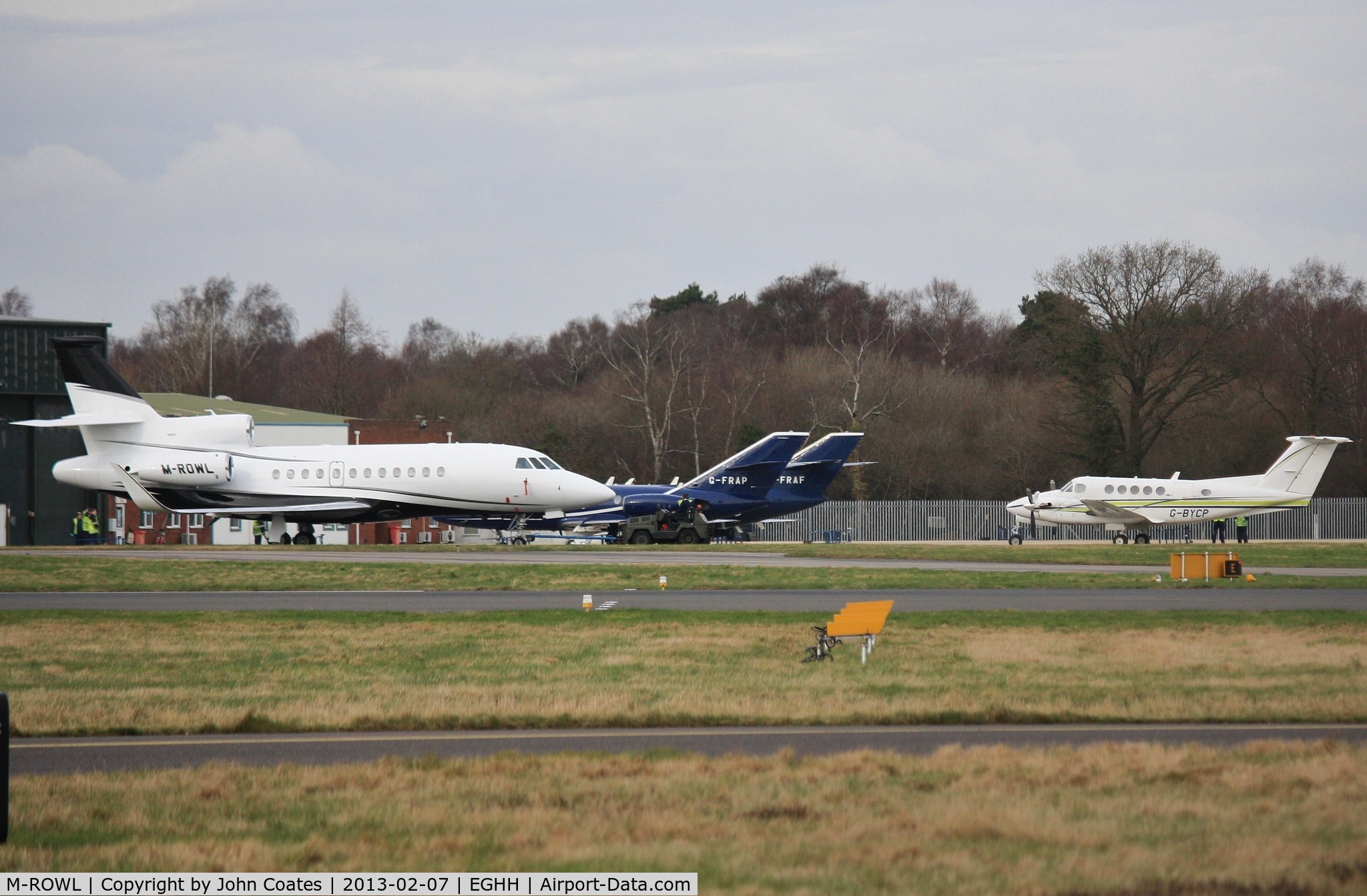 M-ROWL, 2007 Dassault Falcon 900EX C/N 180, Being towed past Cobham ramp.
