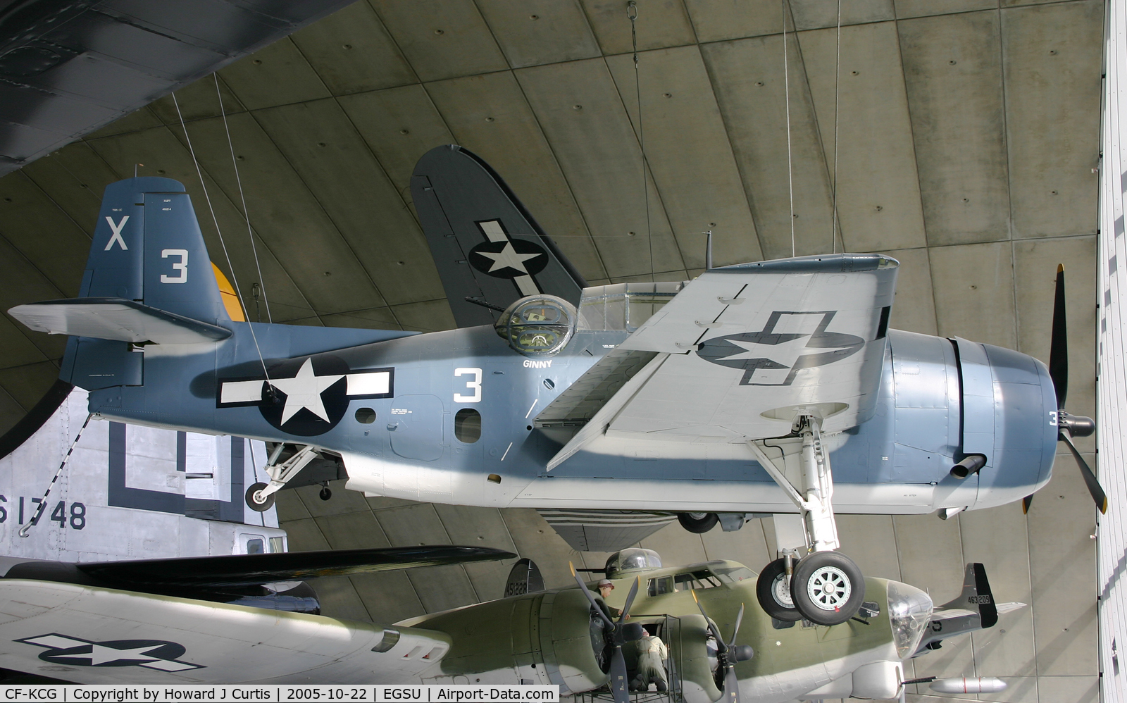 CF-KCG, Grumman TBM-3E Avenger C/N 2066, Painted in US Navy colours as X3. Hanging from the American Air Museum roof.