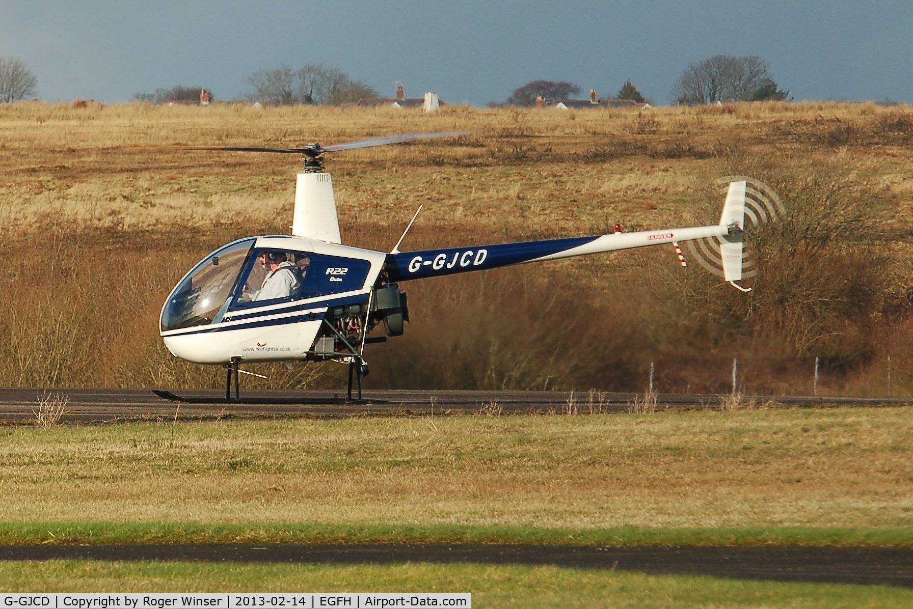 G-GJCD, 1989 Robinson R22 Beta C/N 0966, R22 Beta operating from Swansea Airport. On loan to Heli-air Wales whilst G-LINS is away from base.