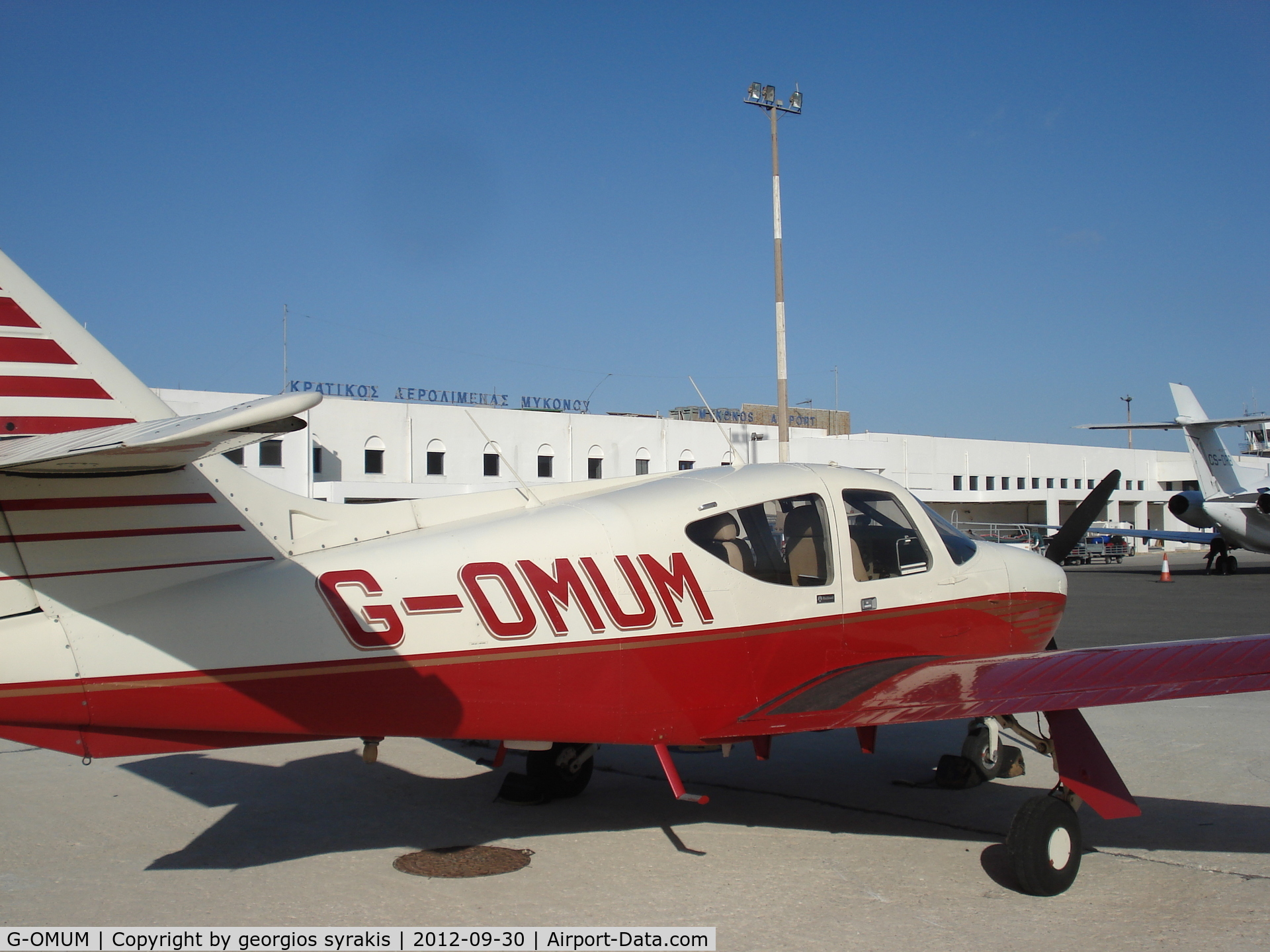 G-OMUM, 1976 Rockwell Commander 114 C/N 14067, mykonos airport 2012