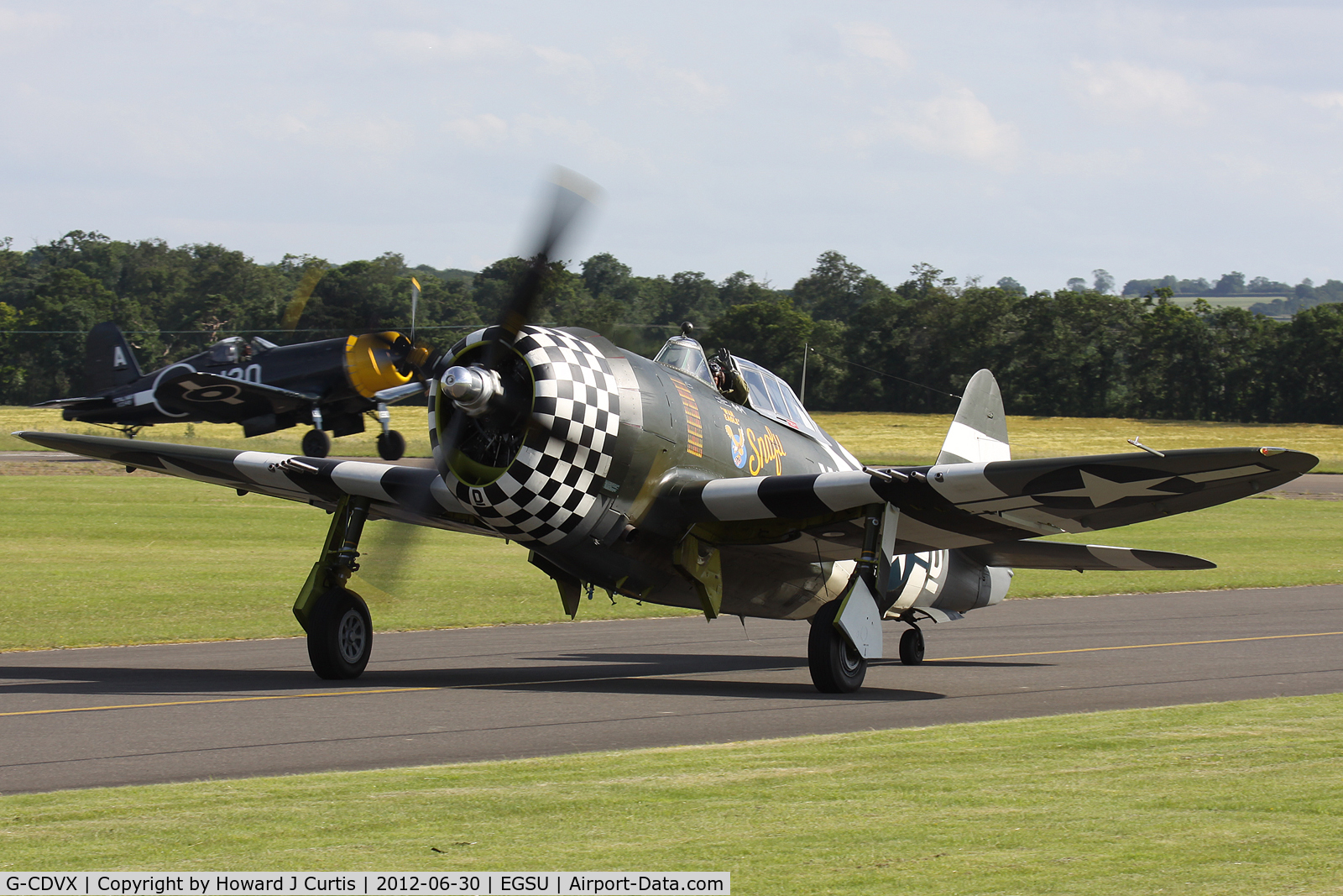 G-CDVX, 1942 Curtiss P-47G Thunderbolt C/N 21953, At Flying Legends 2012. Taxiing back after the final display.