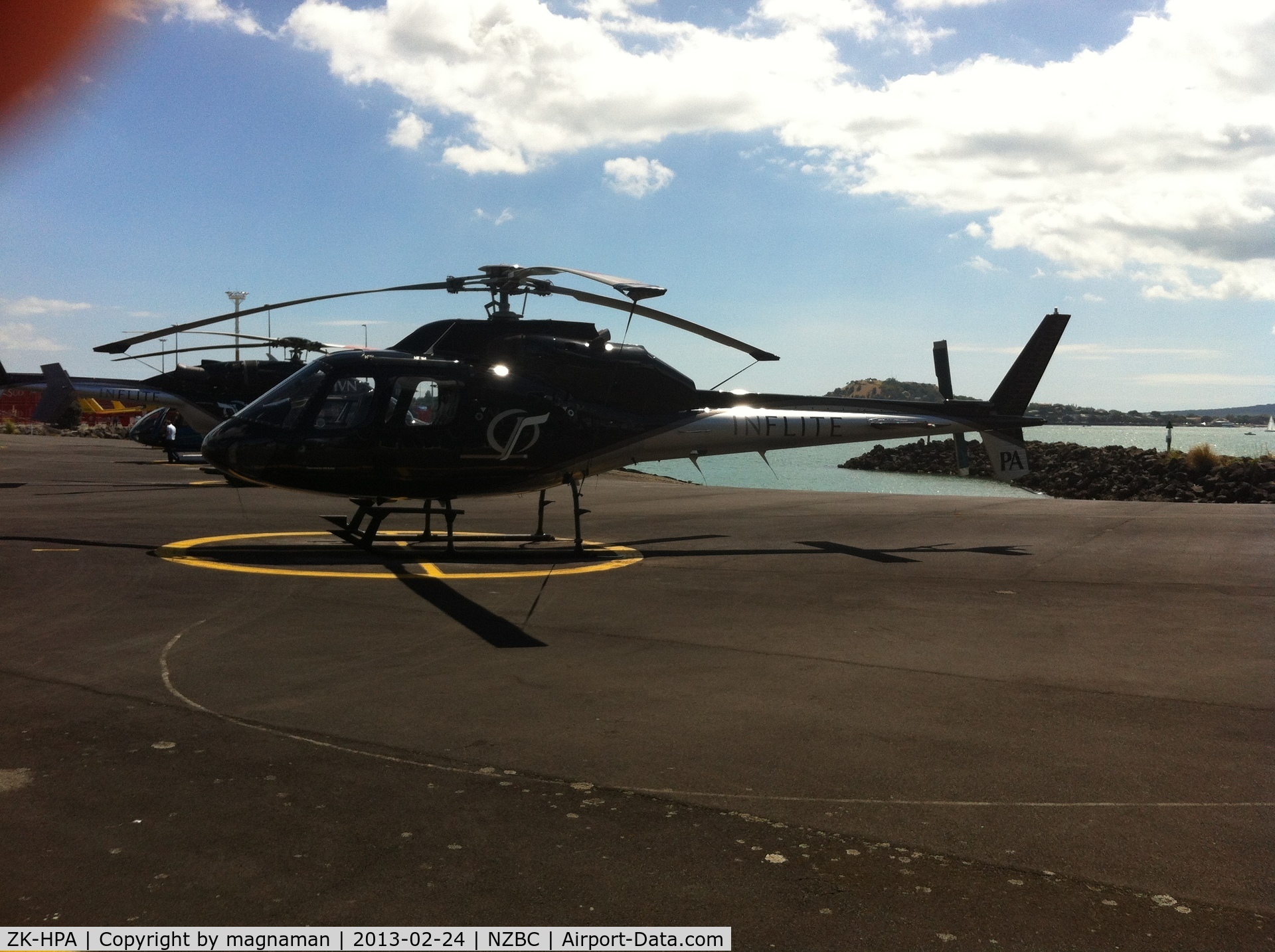 ZK-HPA, Aerospatiale AS-355F-1 Ecureuil 2 C/N 5010, At main Auckland Docks Heliport. Free parking for up to 2 hours and usually something happening in that time. Today there were 6 choppers in at once. (1 x police; 2 x rescue; 2 x heliflite and 1 x private)