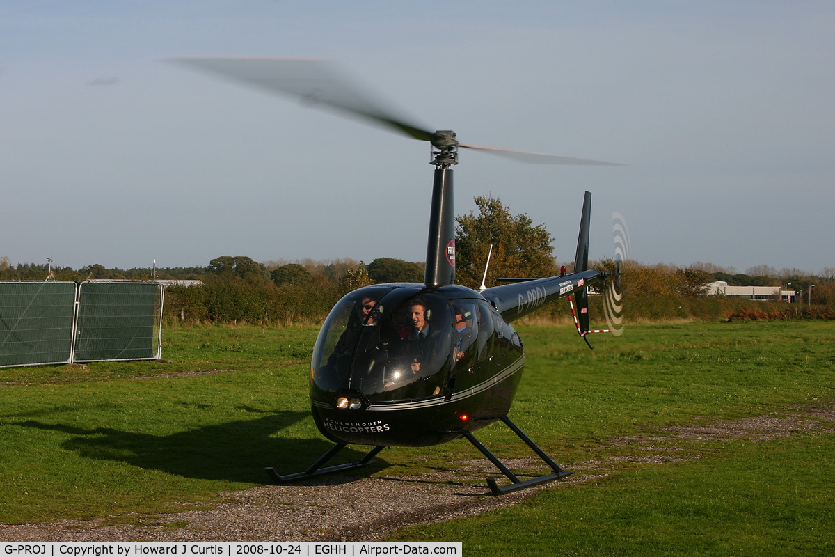 G-PROJ, 2007 Robinson R44 Raven II C/N 11695, Bringing guests to open the Bournemouth Aviation Museum at its new location.