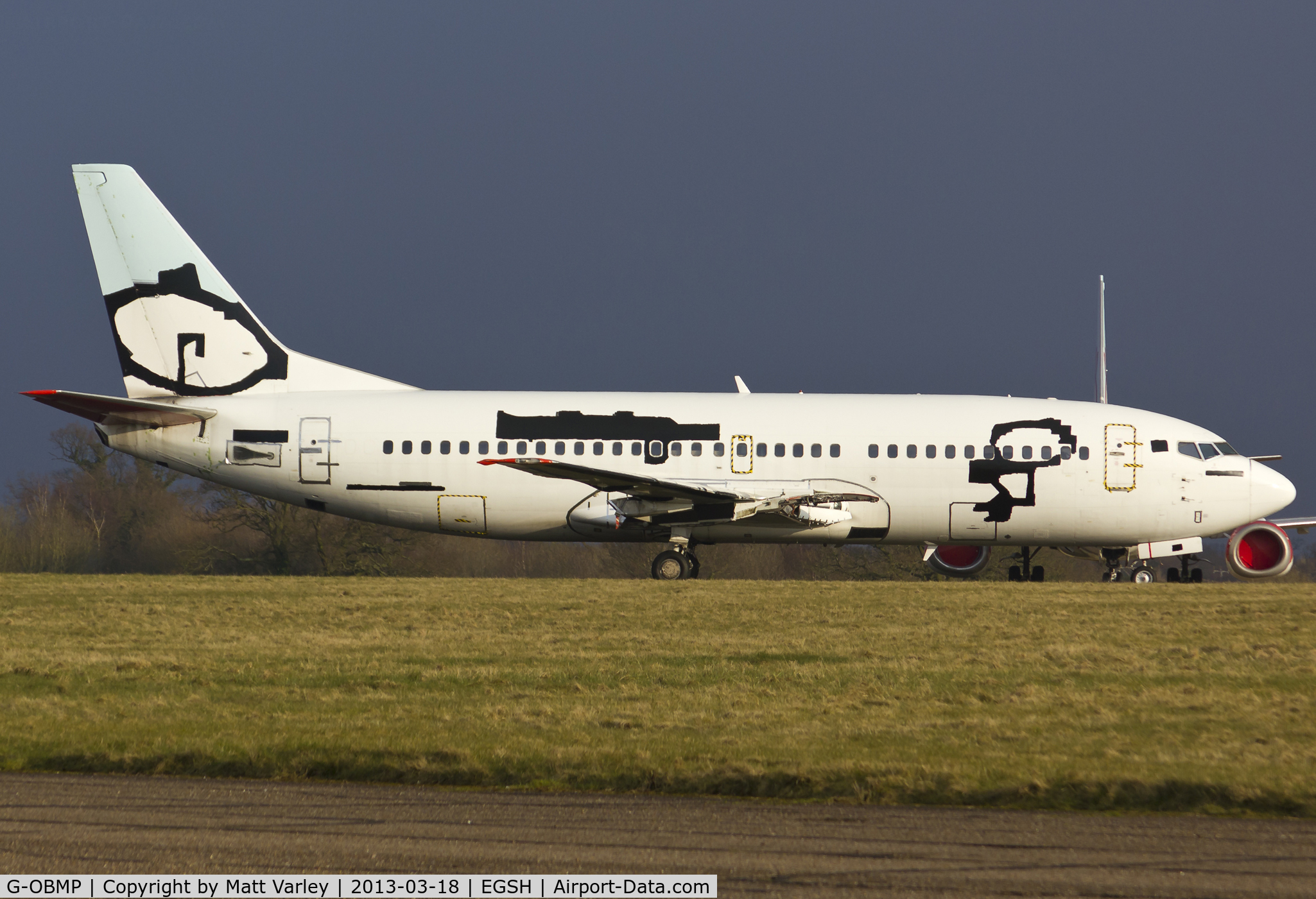 G-OBMP, 1992 Boeing 737-3Q8 C/N 24963, Sat at NWI with all markings taped over.