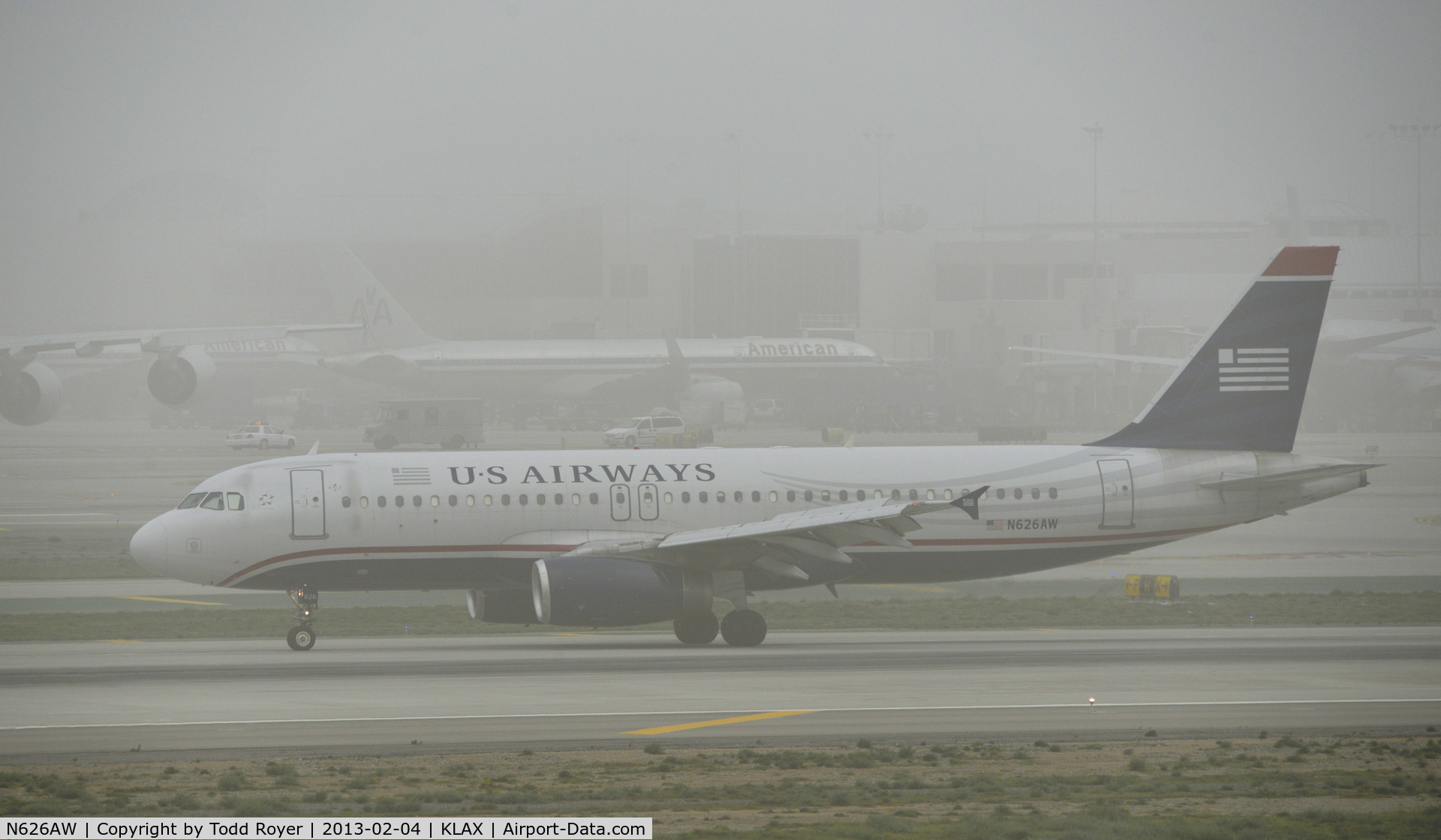 N626AW, 1989 Airbus A320-231 C/N 65, Taxiing to gate on a foggy morning