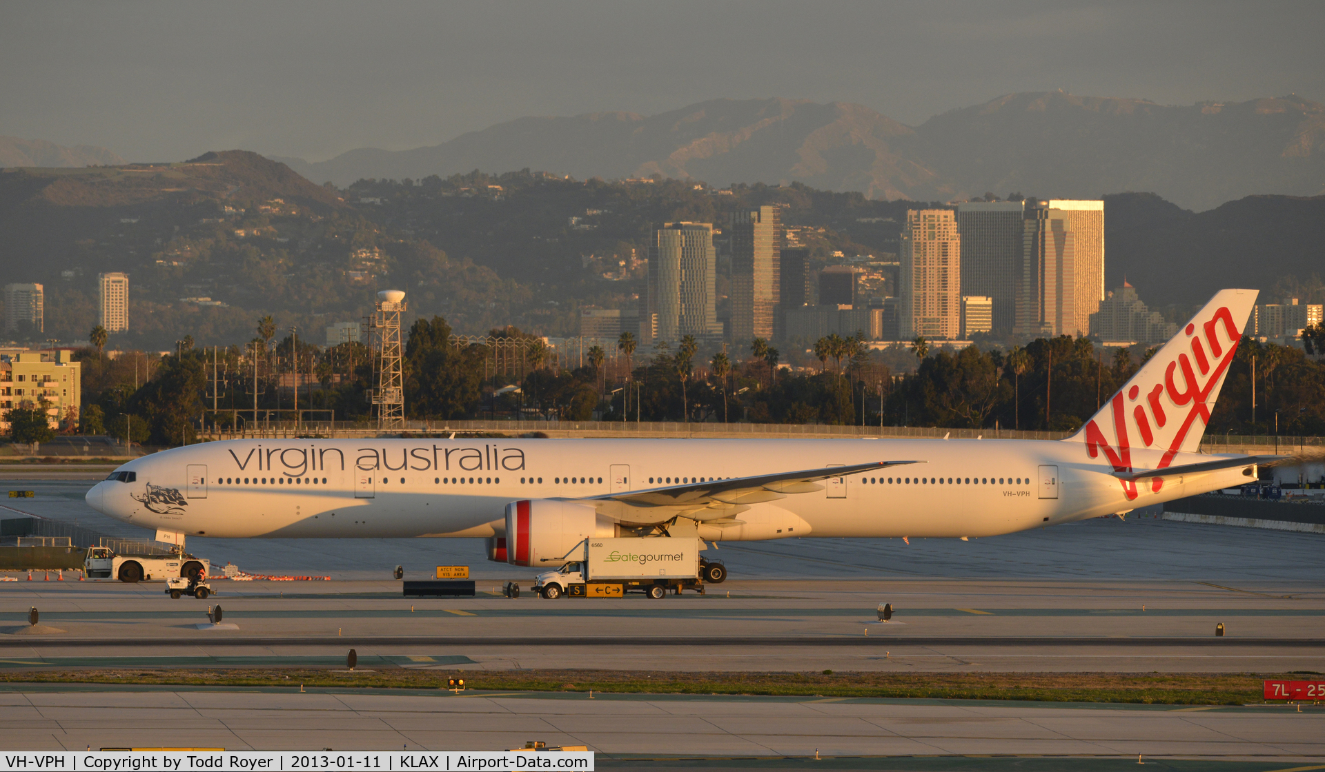 VH-VPH, 2010 Boeing 777-3ZG/ER C/N 37943, Getting a tow to parking at LAX