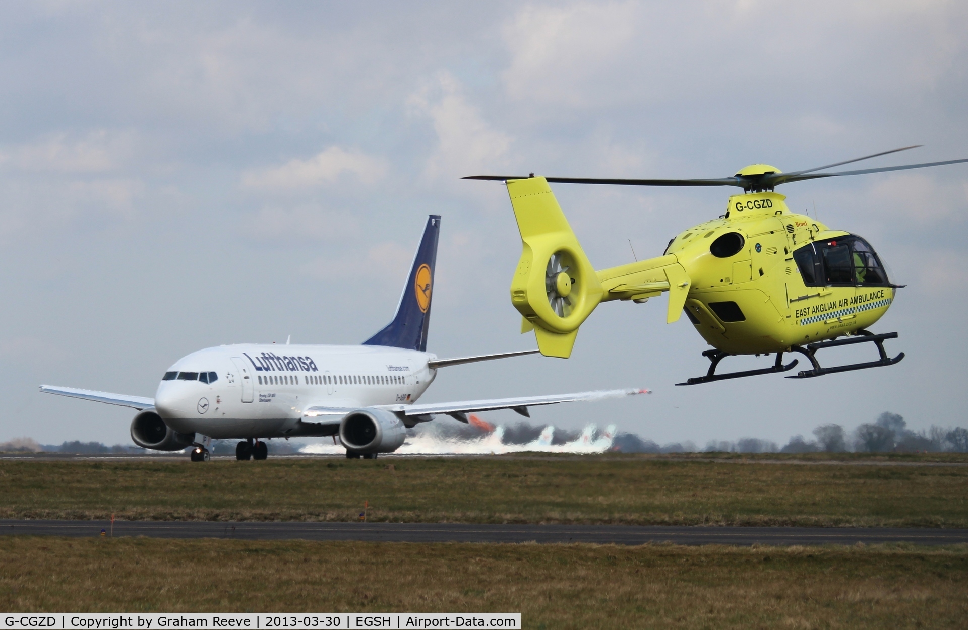G-CGZD, 2006 Eurocopter EC-135P-2 C/N 0460, With D-ABIP in the back ground.