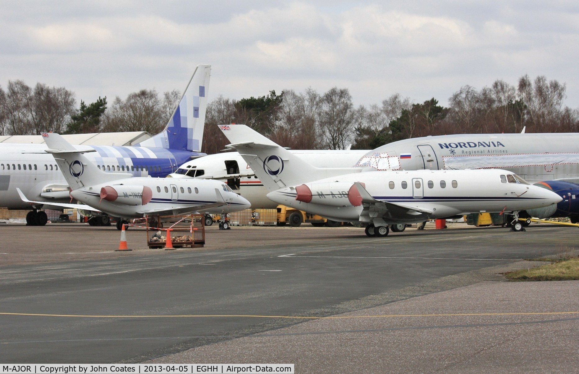 M-AJOR, 2008 Hawker Beechcraft 900XP C/N HA-0058, With stablemate M-INOR on the apron