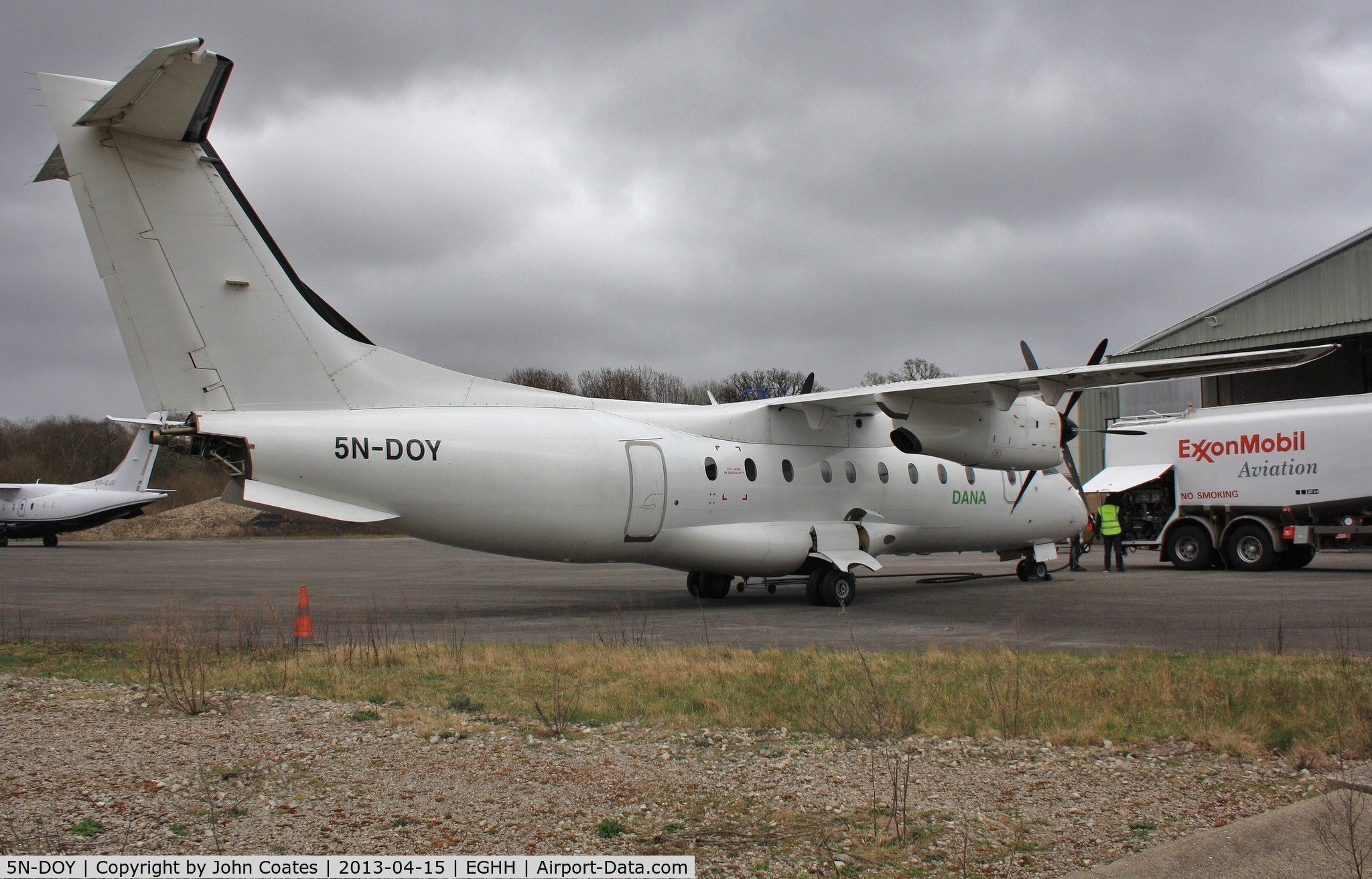 5N-DOY, 1998 Dornier 328-100 C/N 3089, Being fuelled with parts still to be refitted