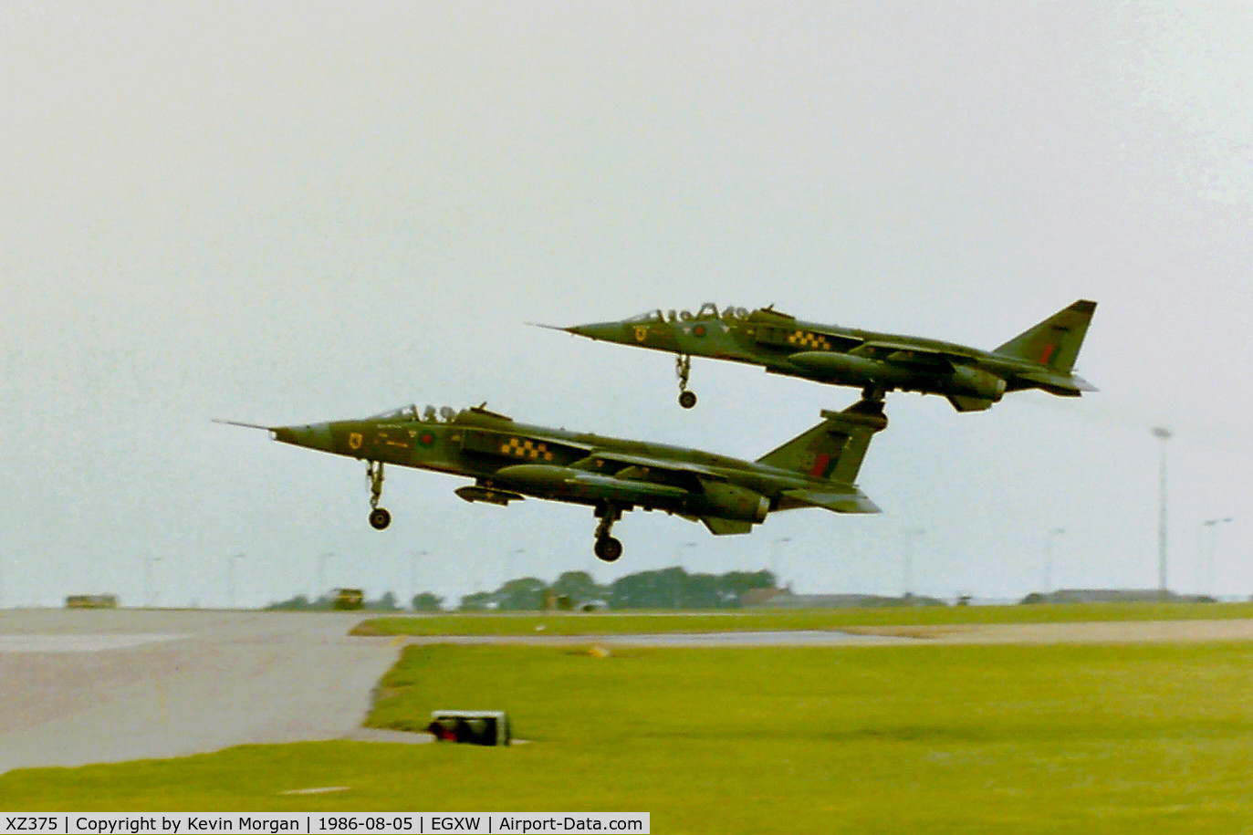 XZ375, 1976 Sepecat Jaguar GR.1A C/N S.142, XZ375/GB 54 Sq Landing with XX146 at RAF Waddington Tactical Fighter Meet 05/08/86