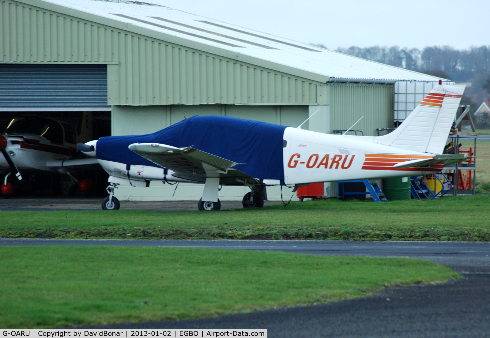 G-OARU, 1989 Piper PA-28R-201 Cherokee Arrow III C/N 2837026, Wrapped up on a cold winters day!
