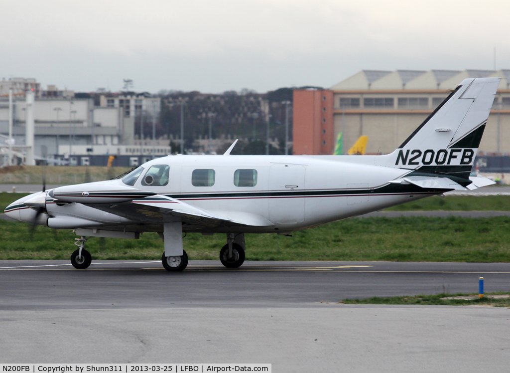 N200FB, 1979 Piper PA-31T1 Cheyenne 1 C/N 31T-7904037, Taxiing holding point rwy 32R for departure...
