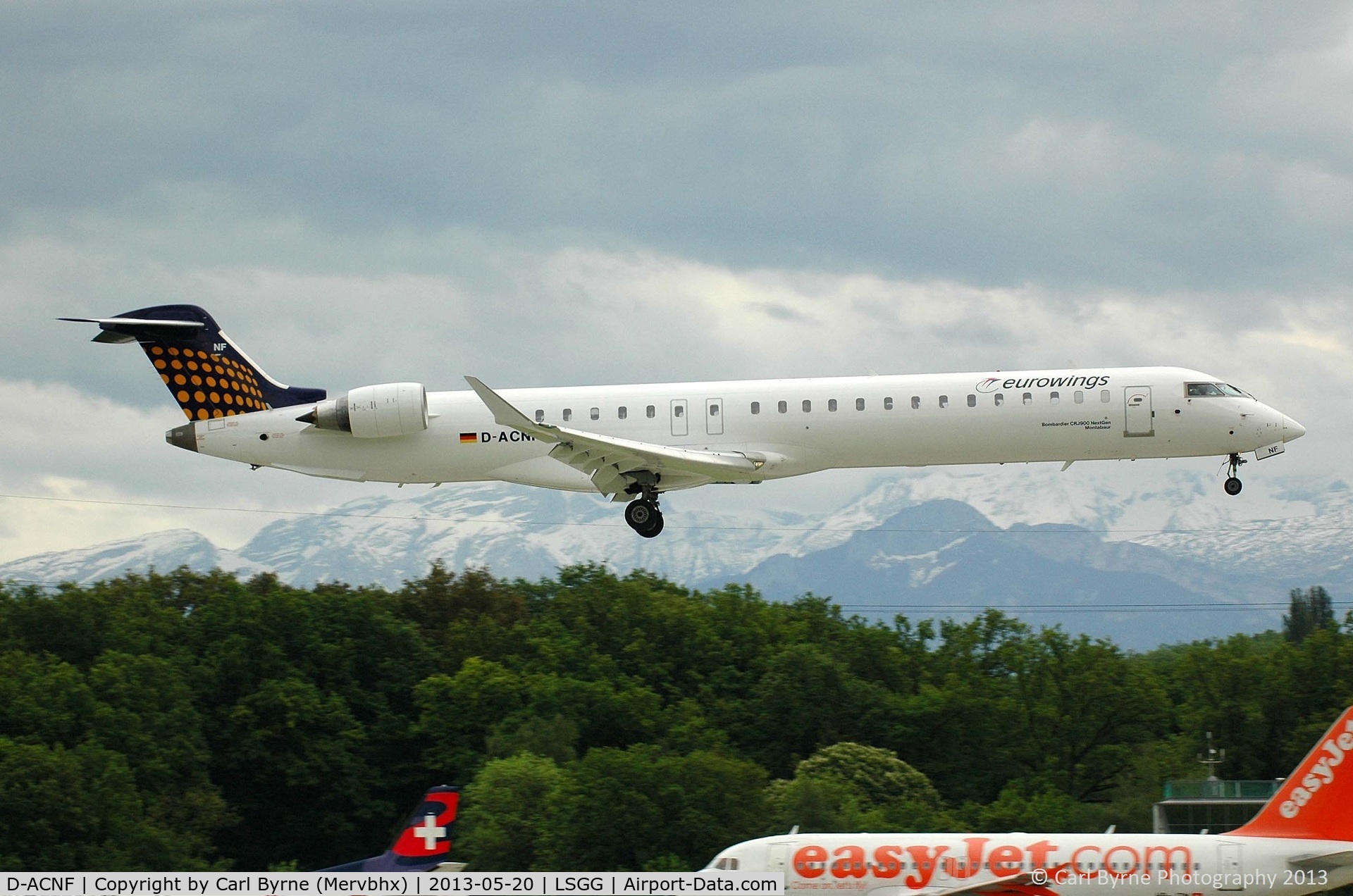D-ACNF, 2009 Bombardier CRJ-900 (CL-600-2D24) C/N 15243, Taken from the park at the 05 threshold.