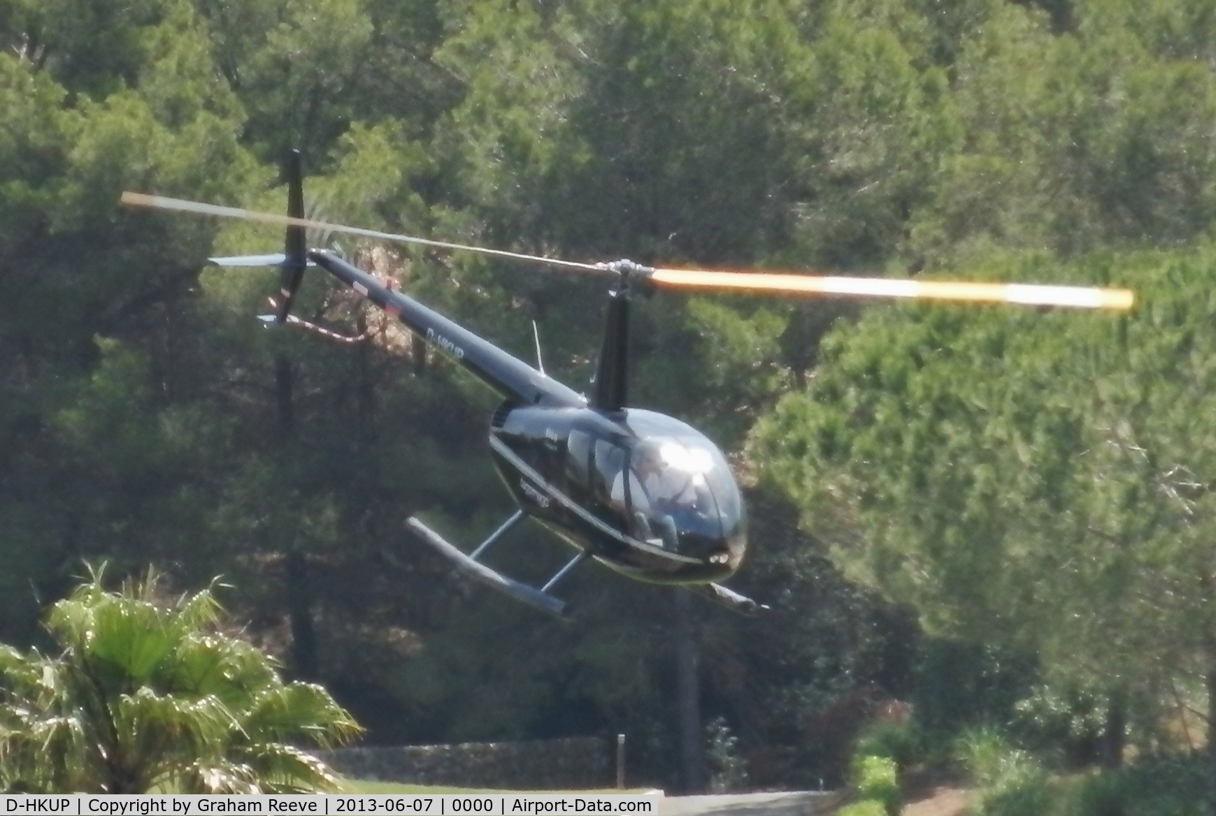 D-HKUP, Robinson R44 C/N 11450, Departing from a golf course in Camp de Mar, Majorca.