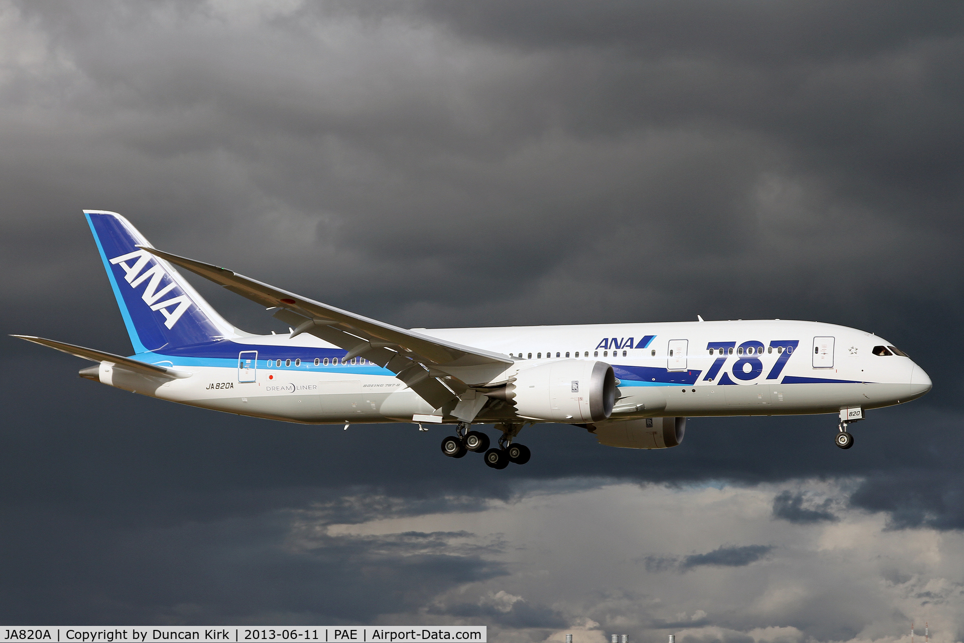 JA820A, 2013 Boeing 787-8 Dreamliner C/N 34511, Gorgeous shot with menacing dark sky back ground