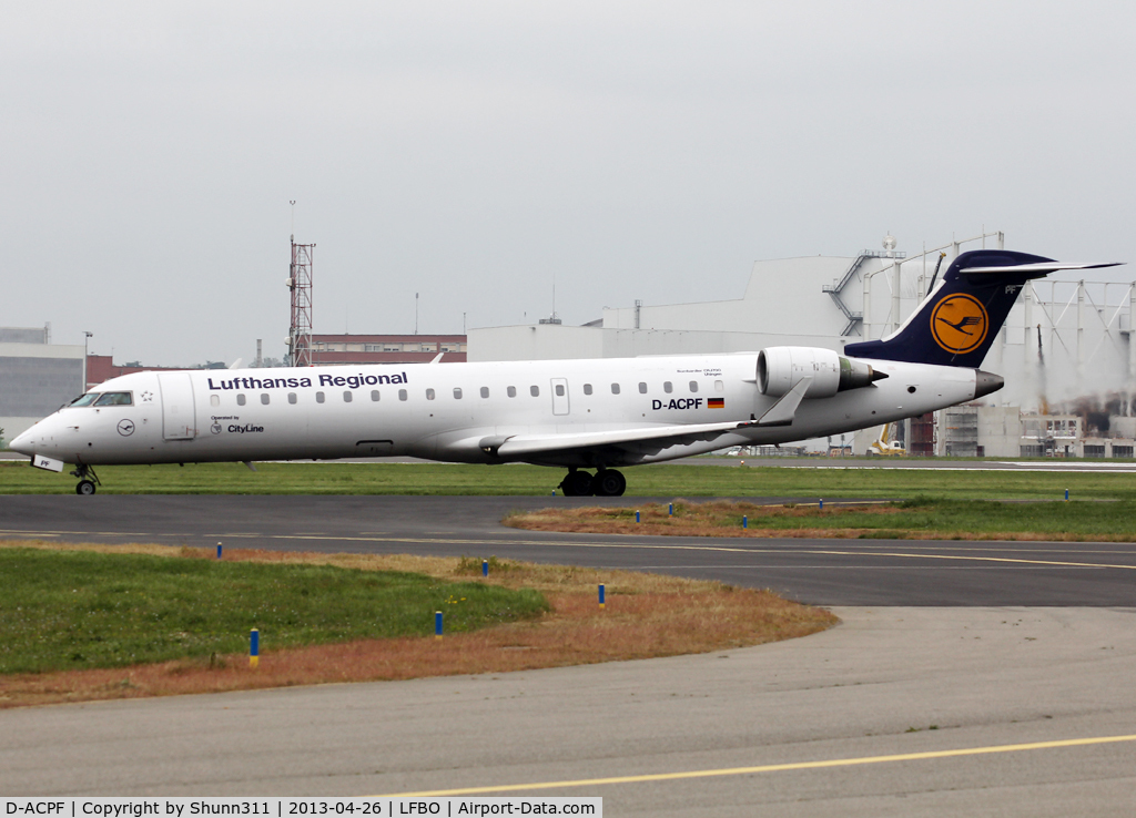 D-ACPF, 2001 Canadair CRJ-701ER (CL-600-2C10) Regional Jet C/N 10030, Taxiing holding point rwy 32R for departure...