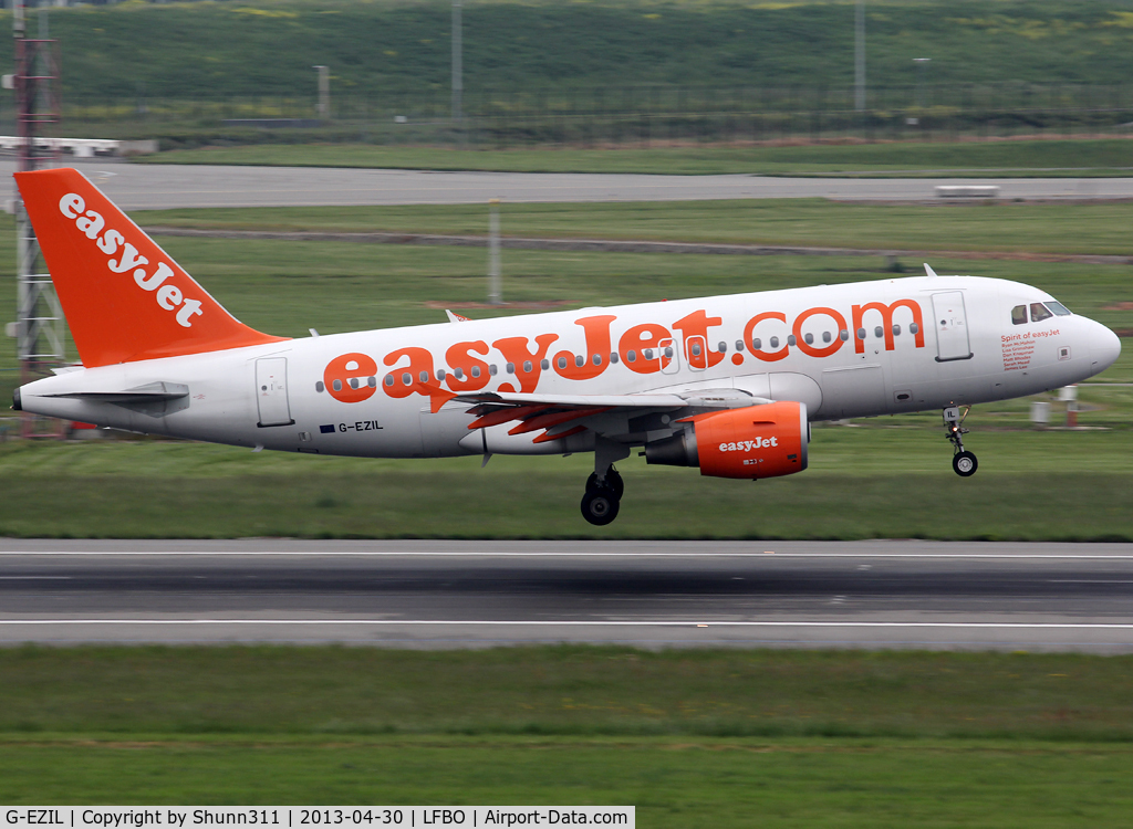 G-EZIL, 2005 Airbus A319-111 C/N 2492, Landing rwy 14R with additional 'Spirit of Easyjet' titles
