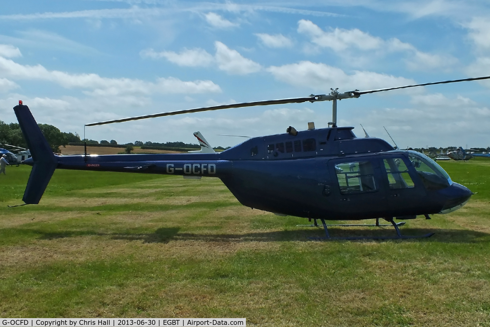G-OCFD, 1980 Bell 206B JetRanger III C/N 3165, being used for ferrying race fans to the British F1 Grand Prix at Silverstone