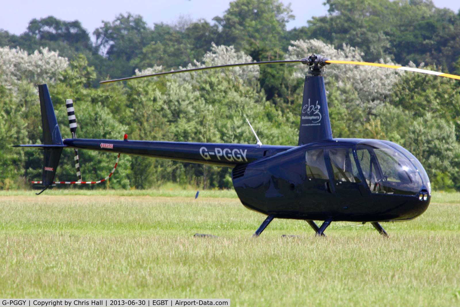 G-PGGY, 2006 Robinson R44 Clipper II C/N 11115, being used for ferrying race fans to the British F1 Grand Prix at Silverstone